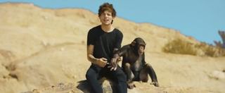 Illustration for article titled New 1D Video Co-Stars Danny DeVito, a Chimp and Cultural Appropriation